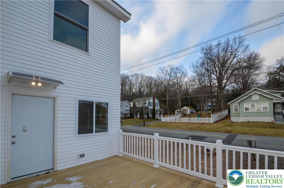 2 Elm Street Mount Pocono, PA 18344 - Photo 42 of 44 a view of a house with a yard and wooden fence