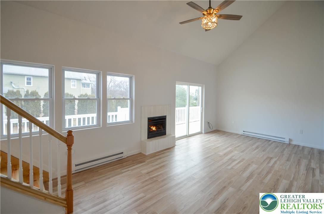2 Elm Street Mount Pocono, PA 18344 - Photo 5 of 44 a view of an empty room with wooden floor and a window