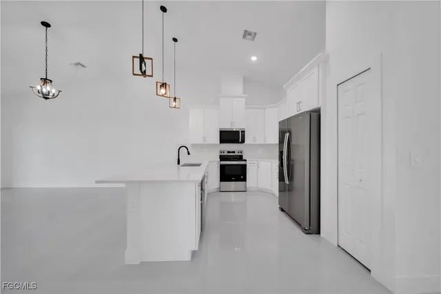 a view of a ceiling fan with a window