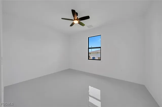 a utility room with cabinets