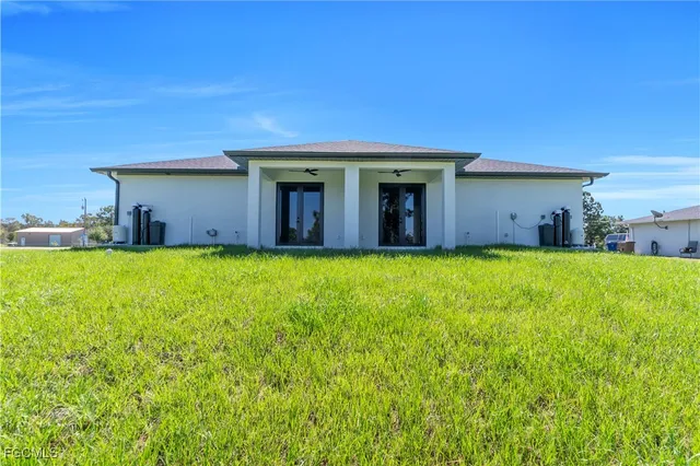 an aerial view of a house with a garden
