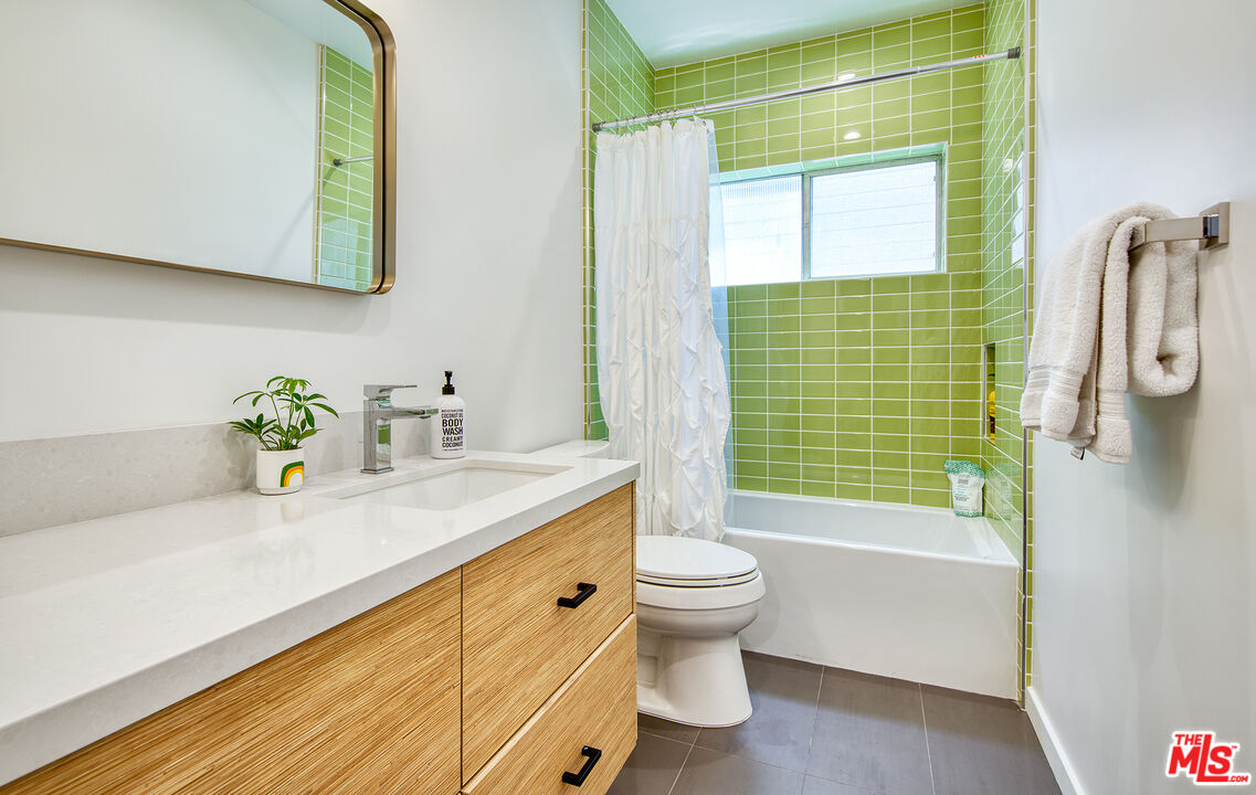 6623 Esplanade Playa del Rey, CA 90293 - Photo 24 of 47 a bathroom with a sink a toilet and shower