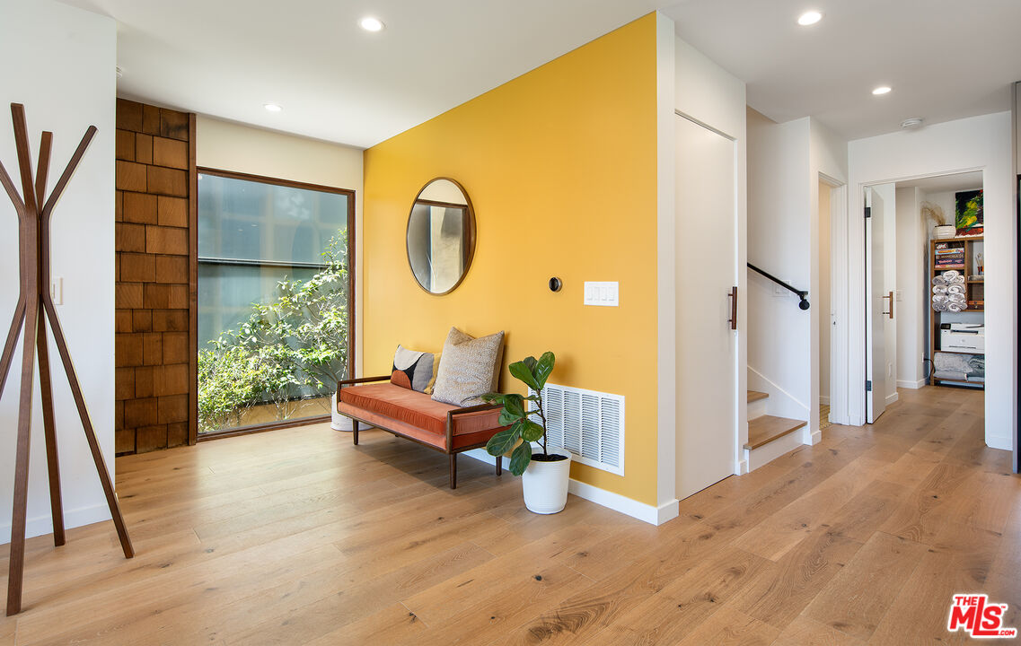 6623 Esplanade Playa del Rey, CA 90293 - Photo 9 of 47 a very nice looking room with wooden floor and a large window