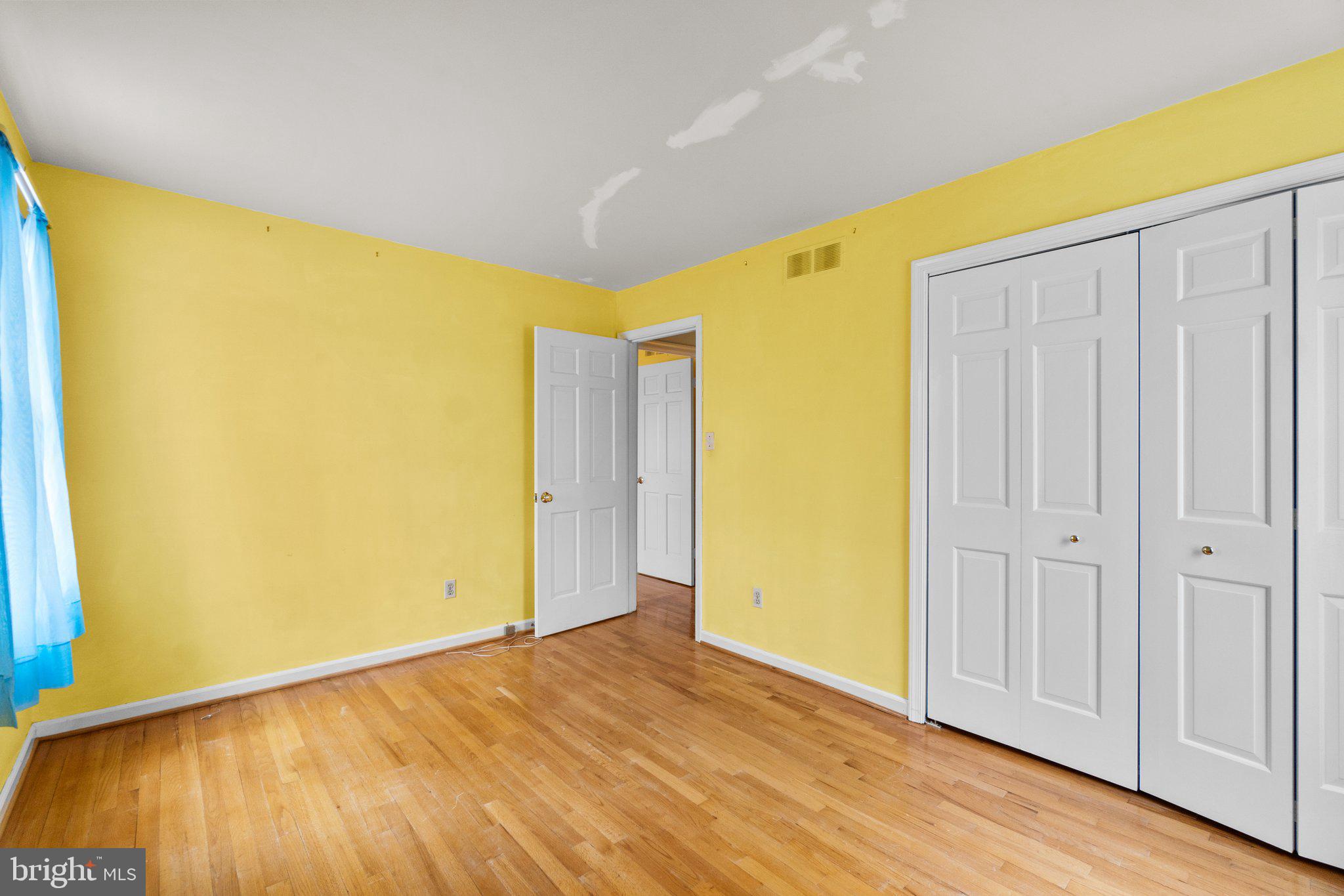 12238 Etchison Road Ellicott City, MD 21042 - Photo 37 of 49 a view of empty room with wooden floor