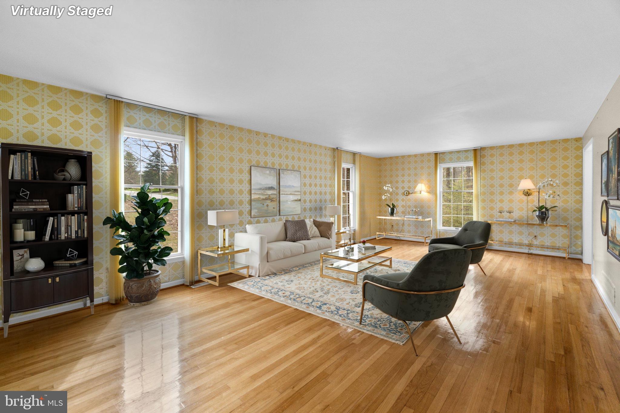 12238 Etchison Road Ellicott City, MD 21042 - Photo 5 of 49 a living room with furniture and wooden floor