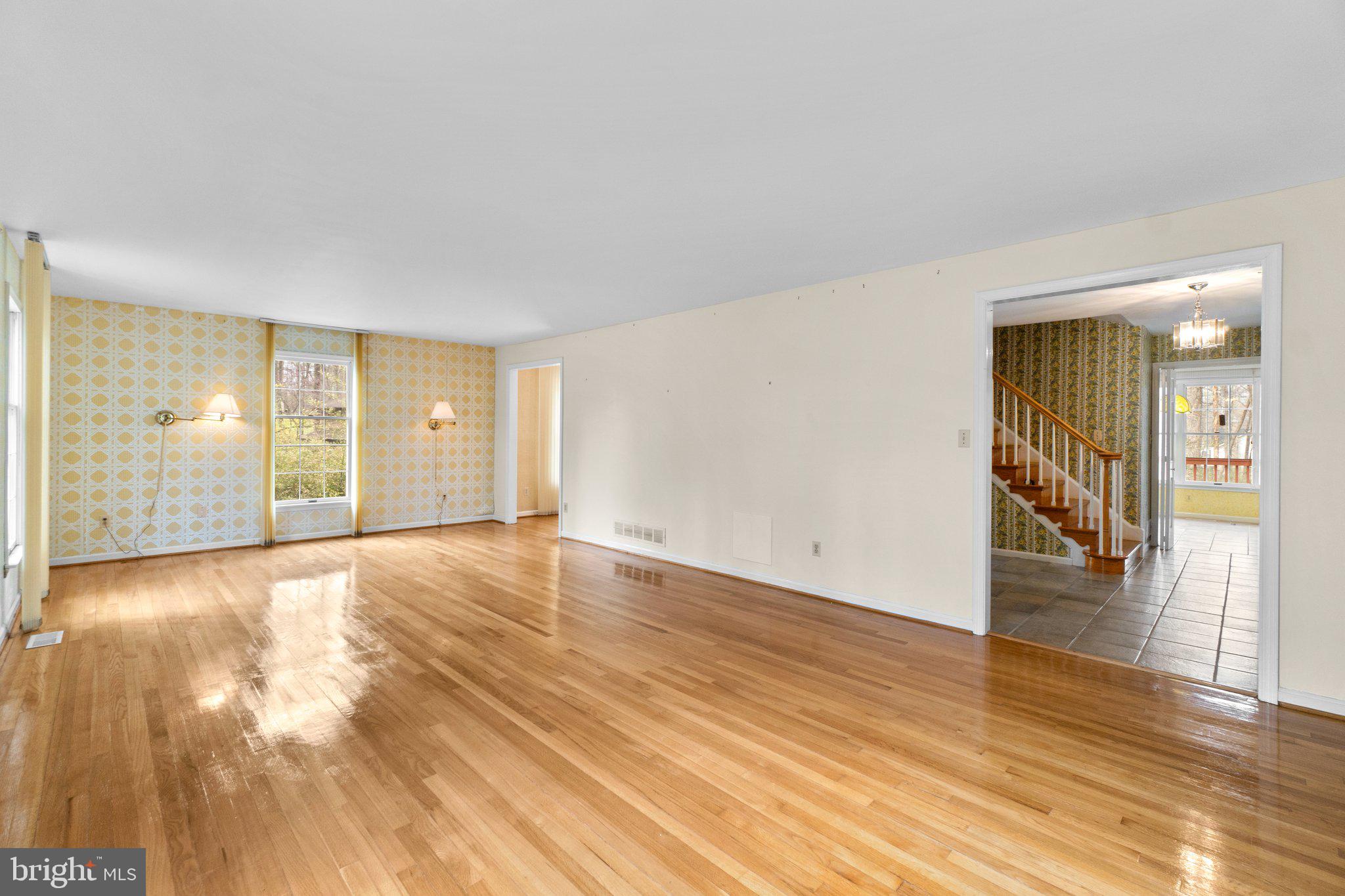 12238 Etchison Road Ellicott City, MD 21042 - Photo 7 of 49 a view of an empty room and wooden floor