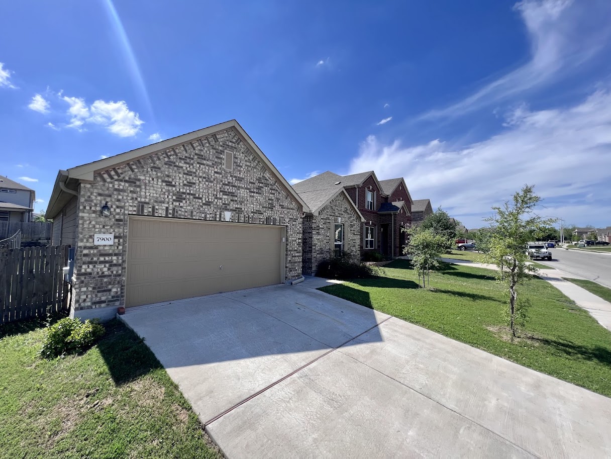7900 Crystalbrook West Austin, TX 78724 - Photo 1 of 27 a view of a house with a yard and pathway