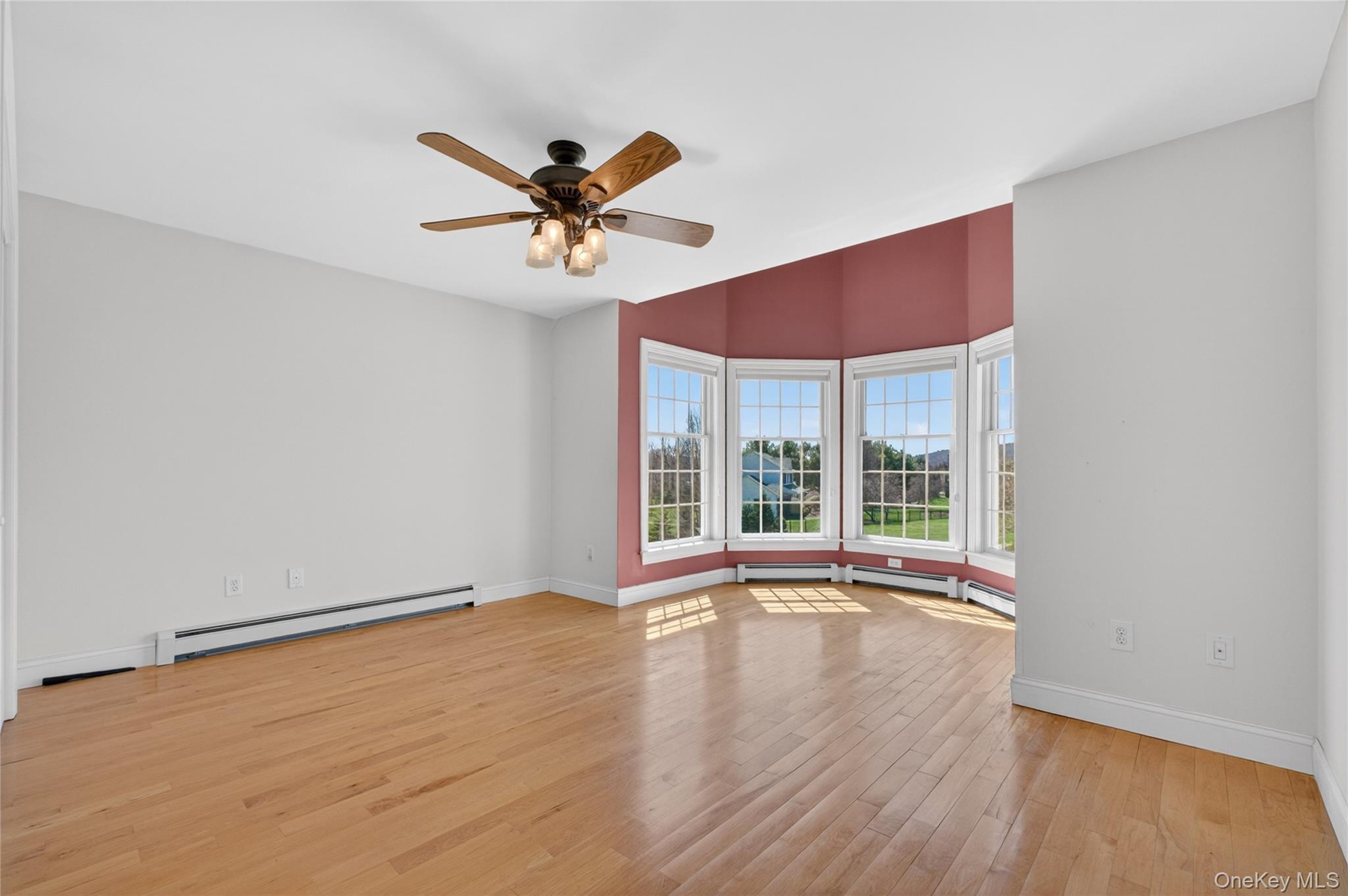 128 Old Pawling Road Pawling, NY 12564 - Photo 11 of 31 a view of empty room with wooden floor and fan