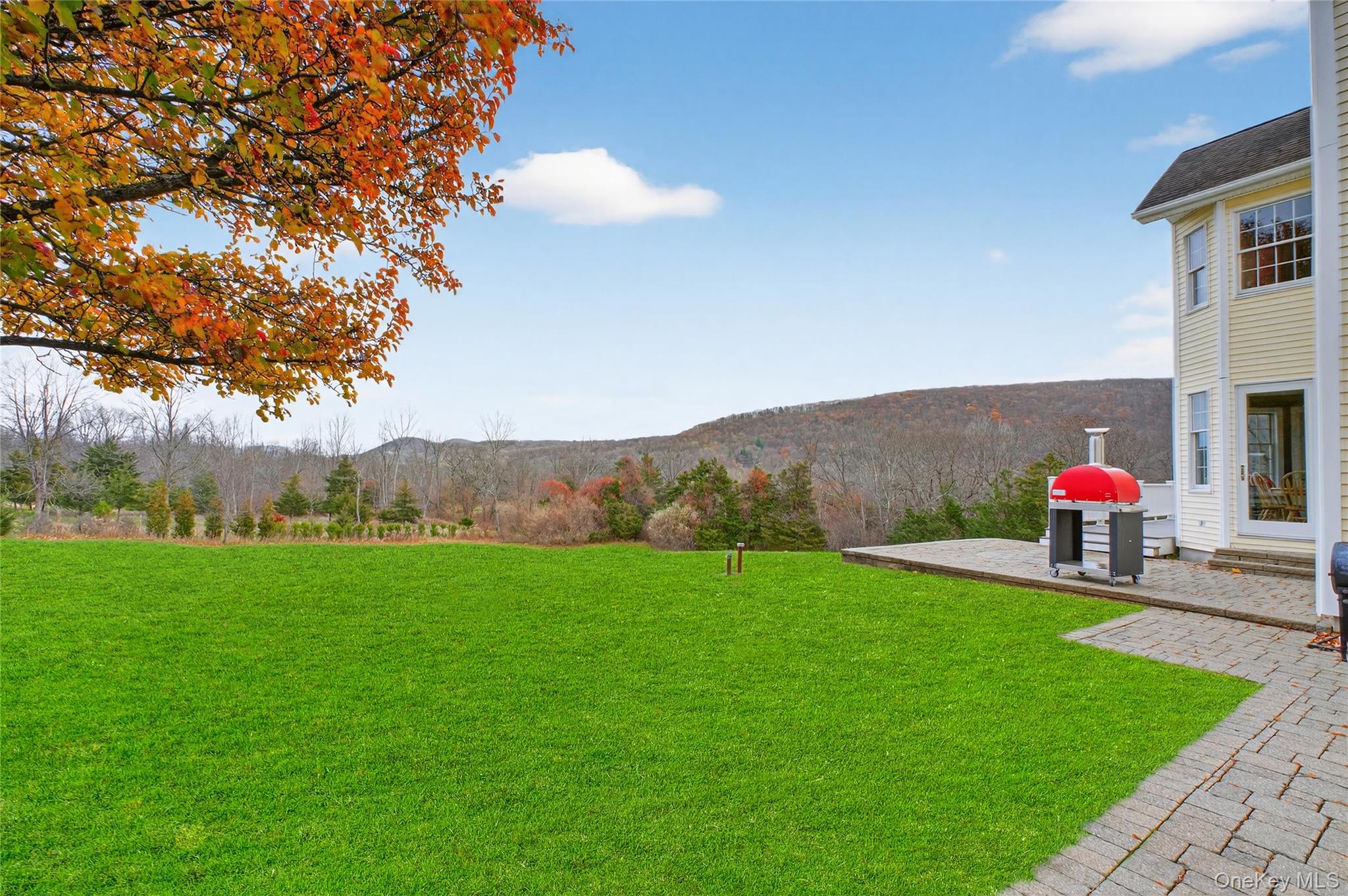 128 Old Pawling Road Pawling, NY 12564 - Photo 14 of 24 a view of a backyard with furniture and a fire pit
