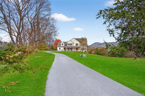 a view of a park with large trees