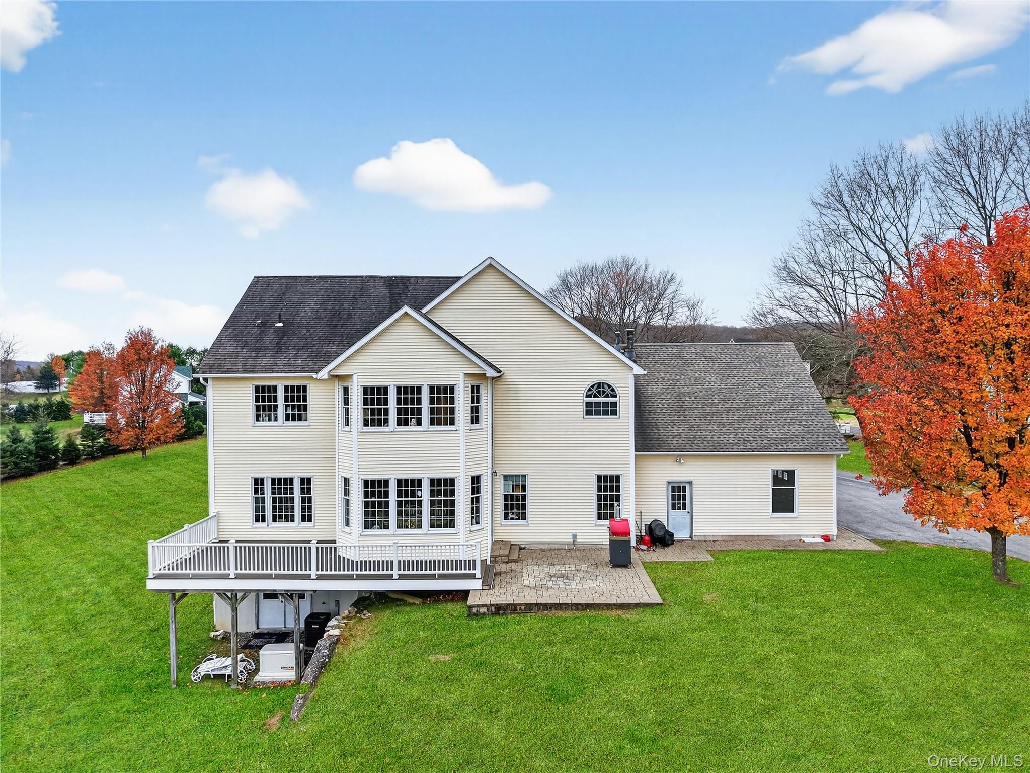 128 Old Pawling Road Pawling, NY 12564 - Photo 26 of 31 a view of a house with a yard and deck