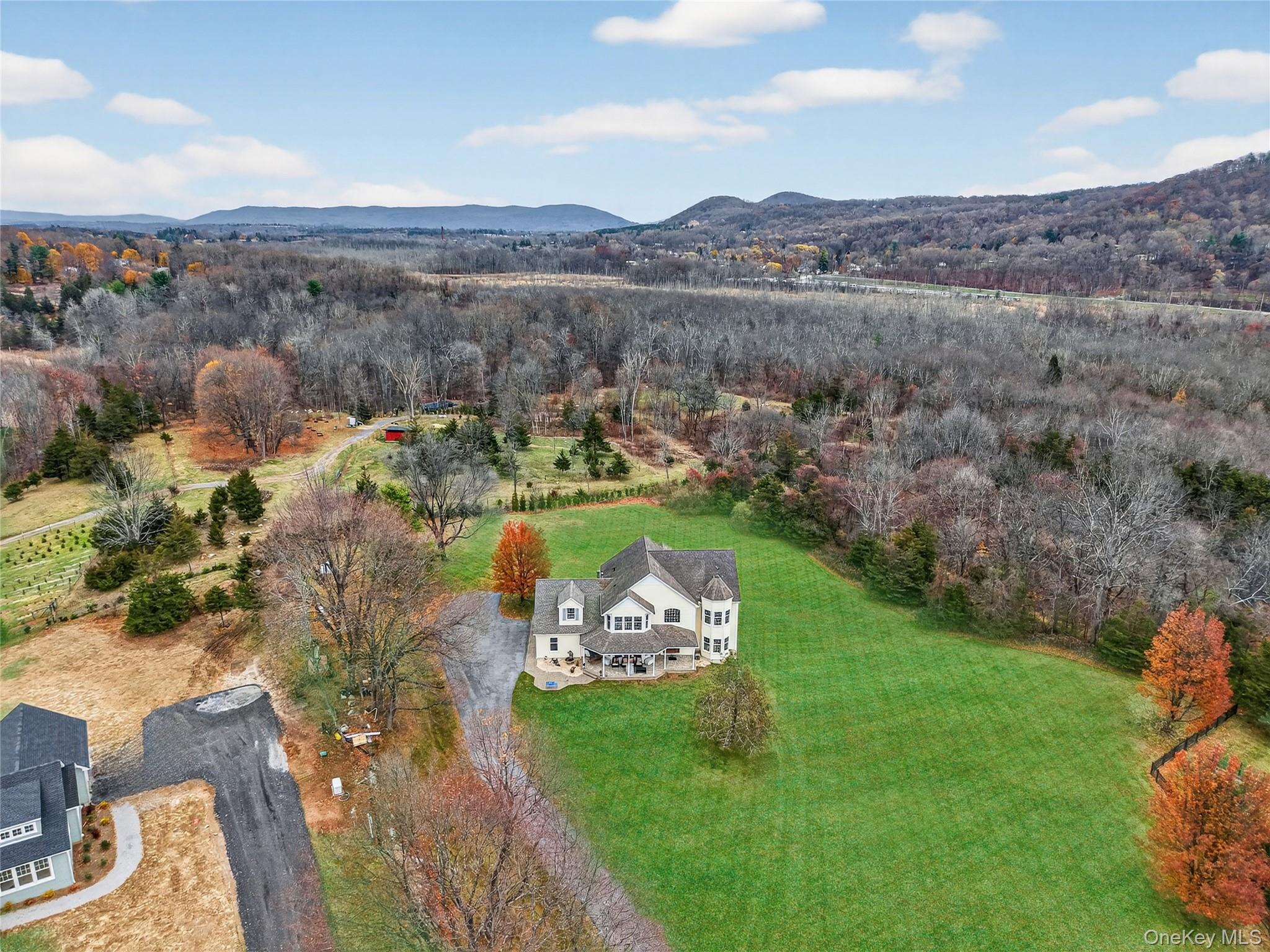 128 Old Pawling Road Pawling, NY 12564 - Photo 28 of 31 a view of a lake with a mountain