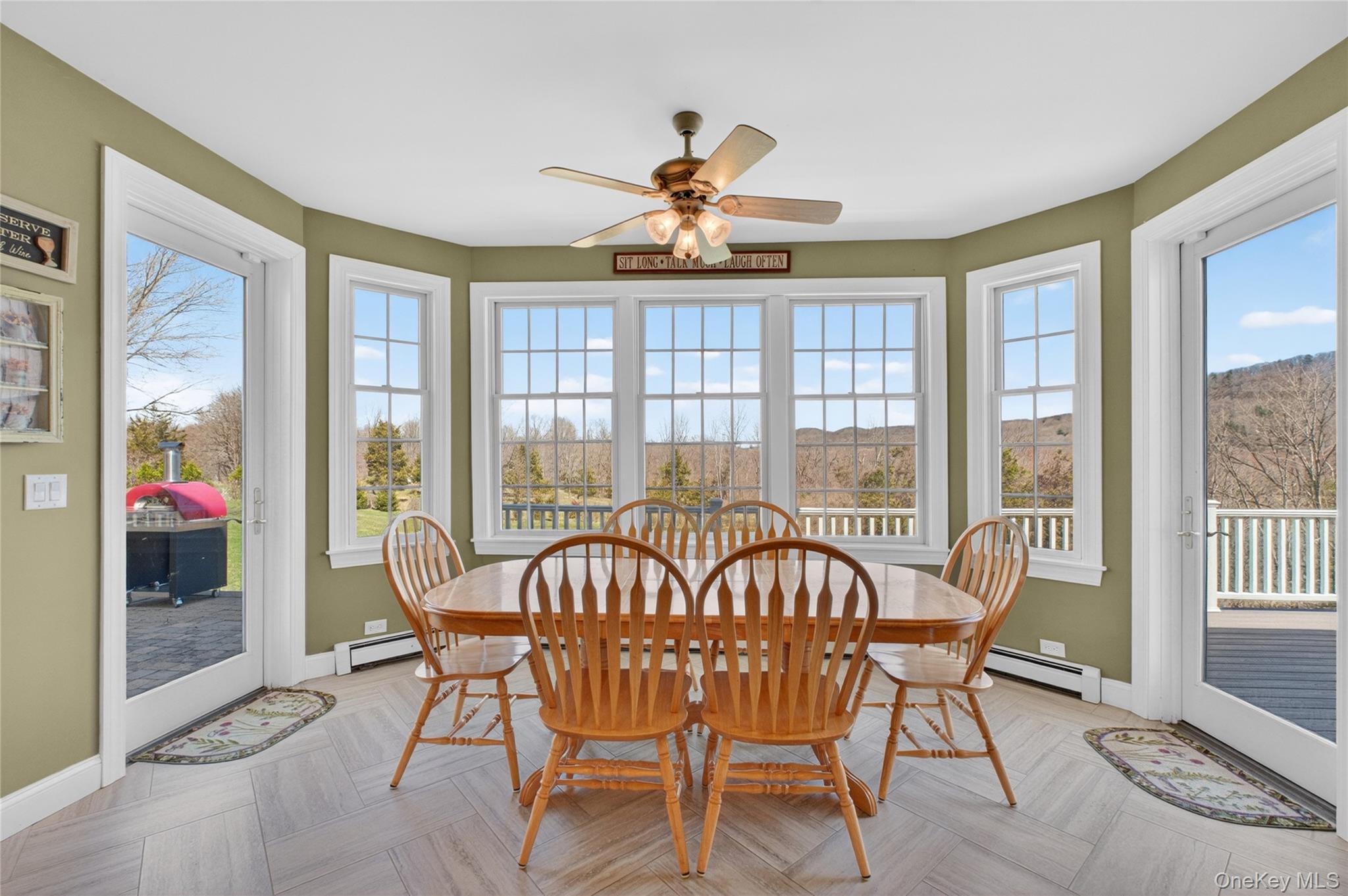 128 Old Pawling Road Pawling, NY 12564 - Photo 4 of 31 a view of a dining room with furniture wooden floor and a chandelier