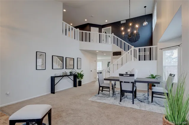 a view of a livingroom with furniture and furniture