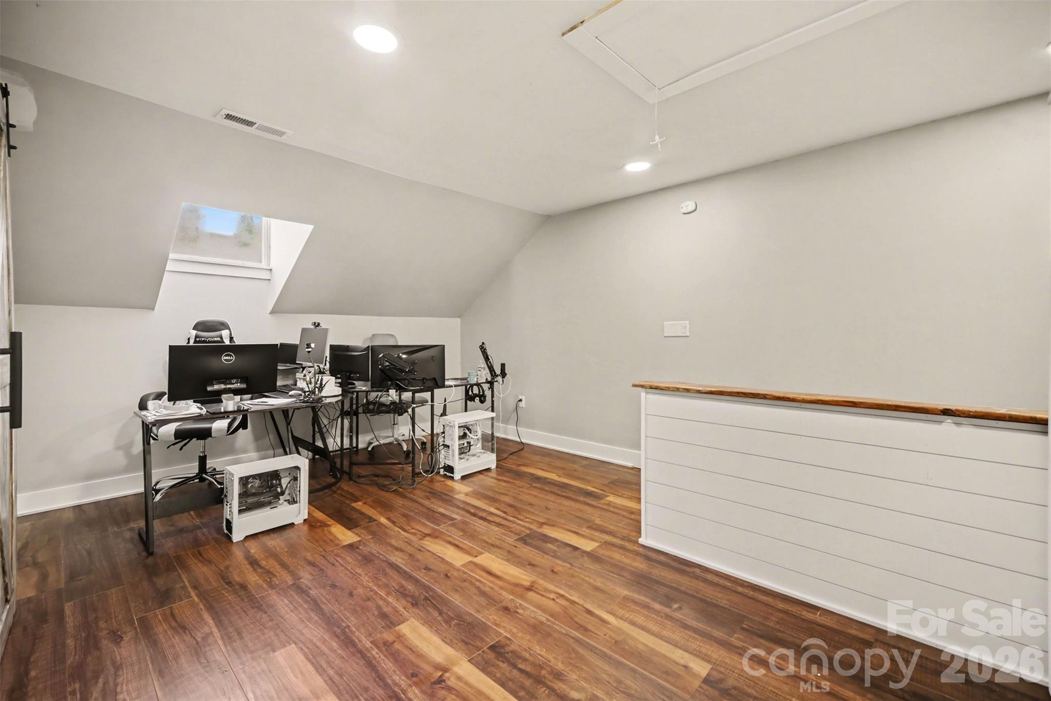 5226 Old Plank Road Iron Station, NC 28080 - Photo 16 of 45 a workspace with wooden floor