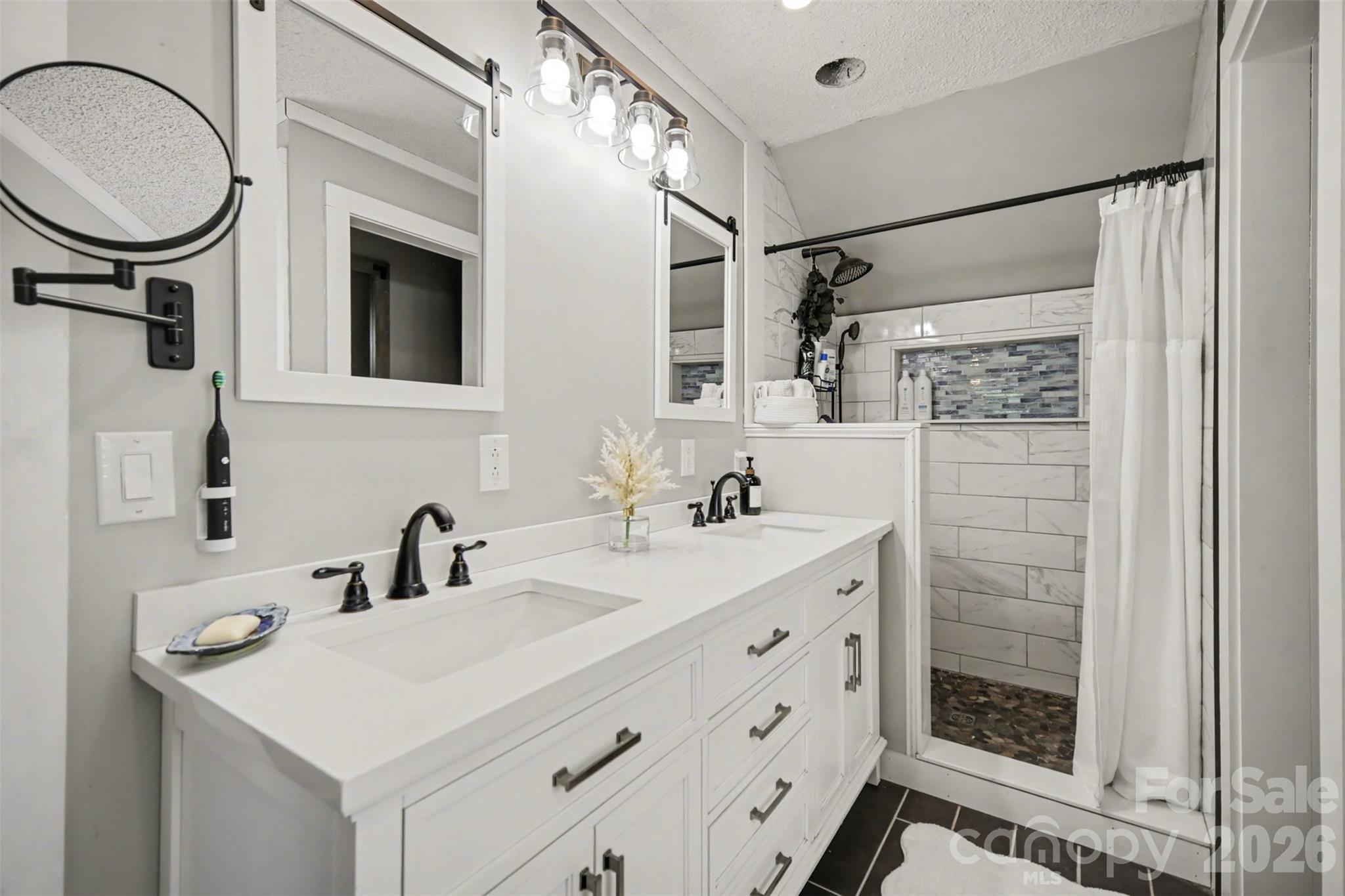 5226 Old Plank Road Iron Station, NC 28080 - Photo 20 of 45 a bathroom with a sink a toilet and a mirror