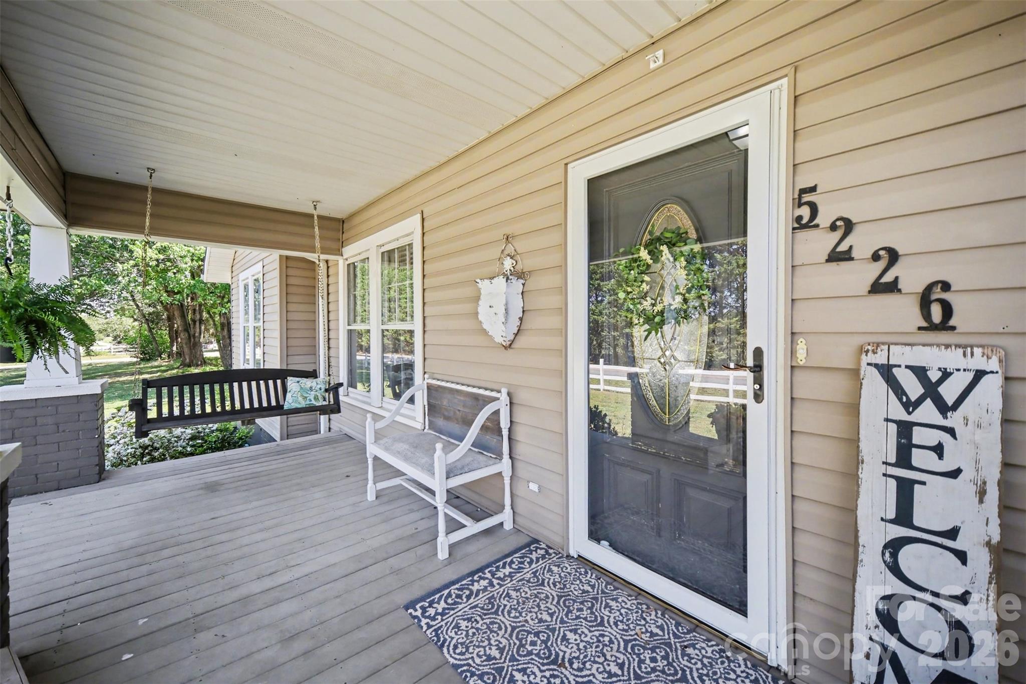 5226 Old Plank Road Iron Station, NC 28080 - Photo 2 of 45 a view of a balcony with furniture