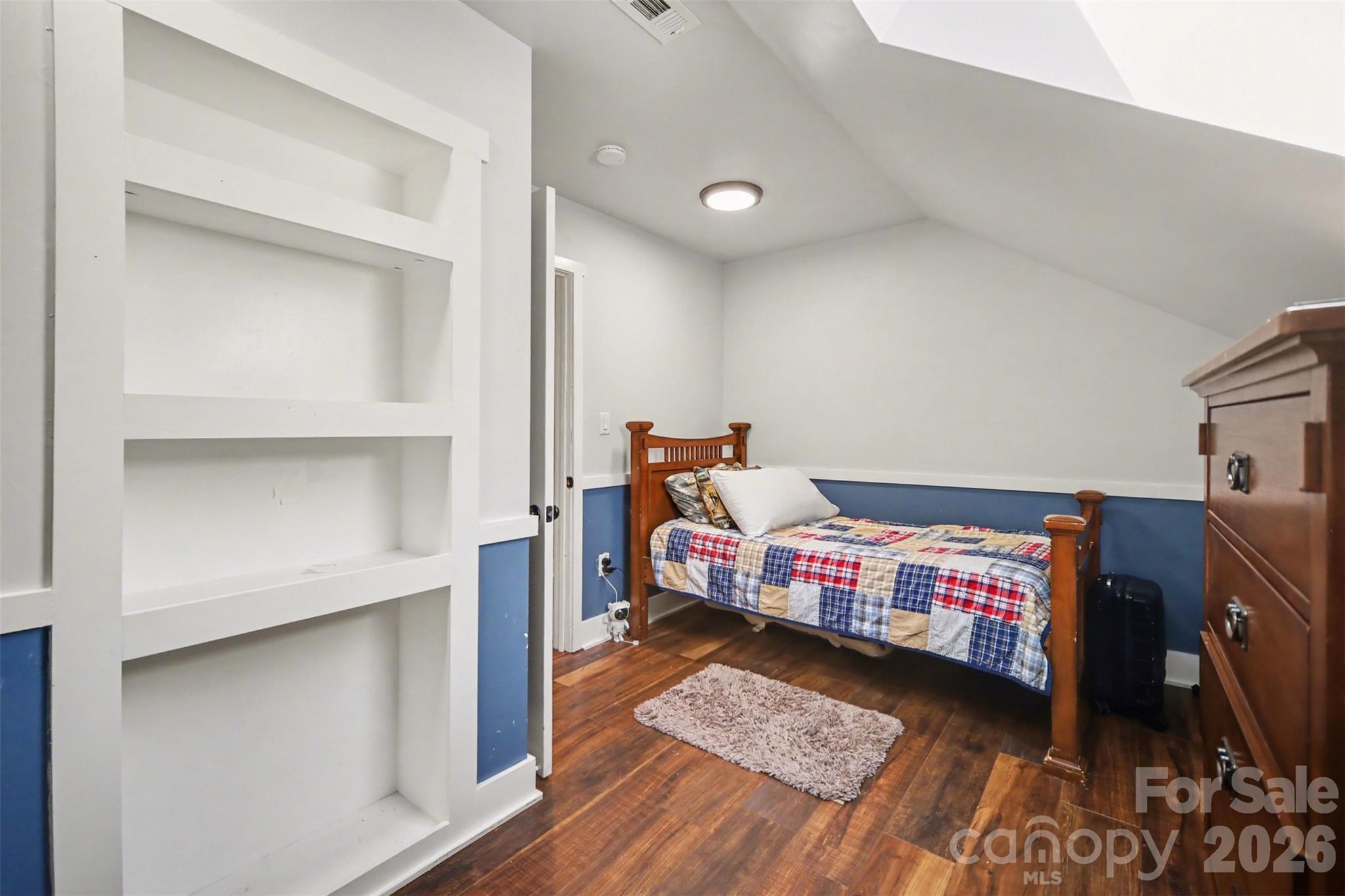 5226 Old Plank Road Iron Station, NC 28080 - Photo 22 of 45 a bed room with a bed and a baby crib