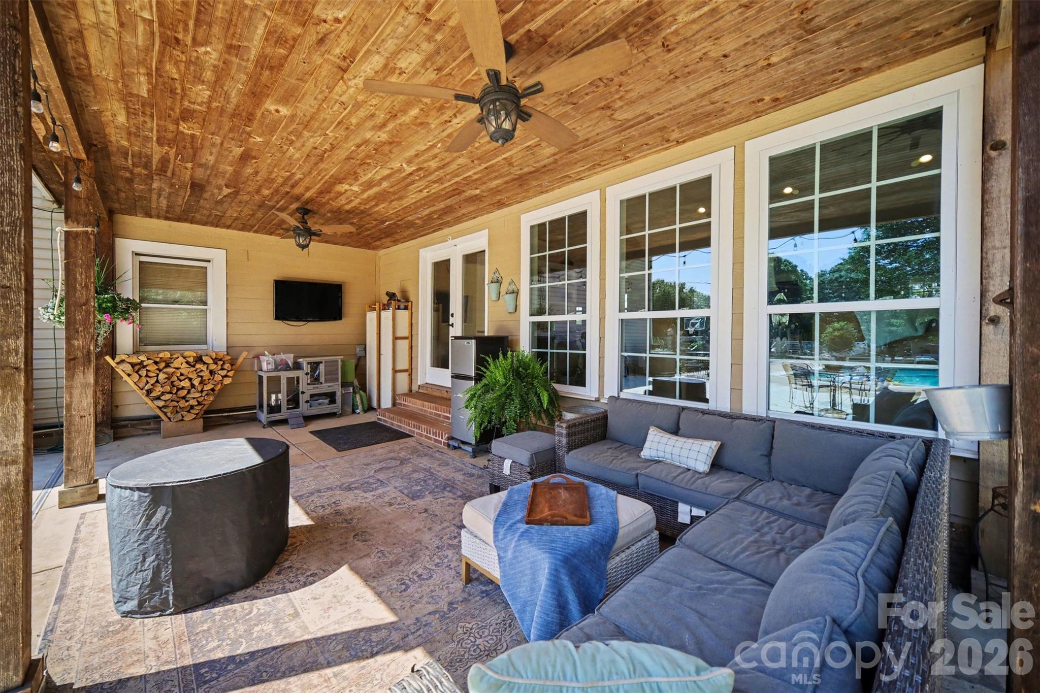 5226 Old Plank Road Iron Station, NC 28080 - Photo 30 of 45 a living room with furniture and a large window