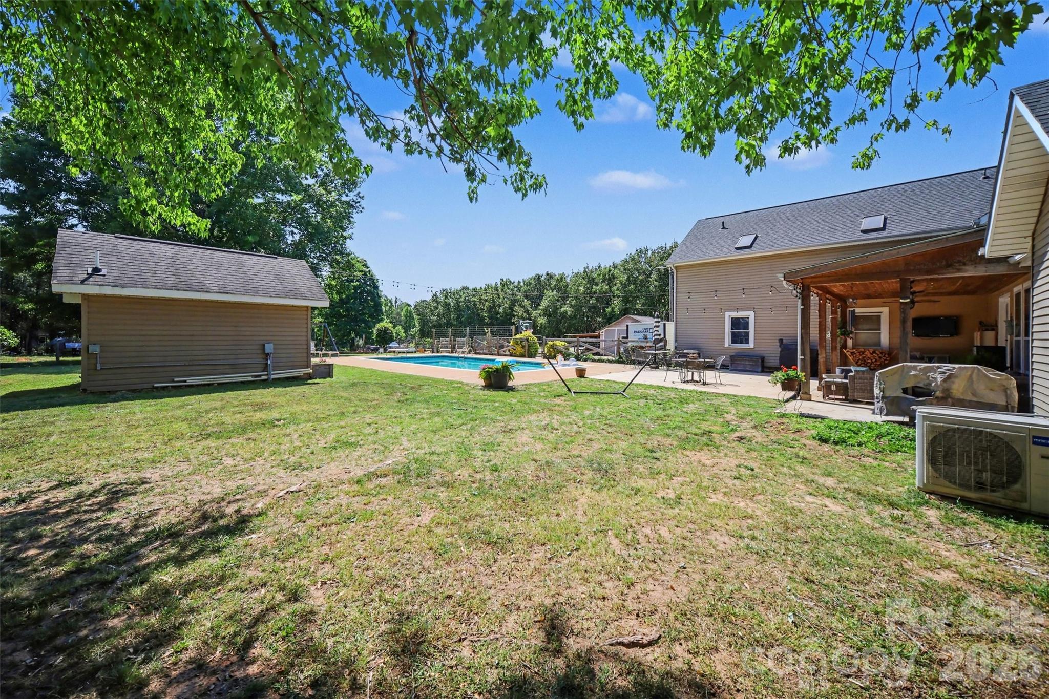 5226 Old Plank Road Iron Station, NC 28080 - Photo 38 of 45 a view of a house with backyard and sitting area