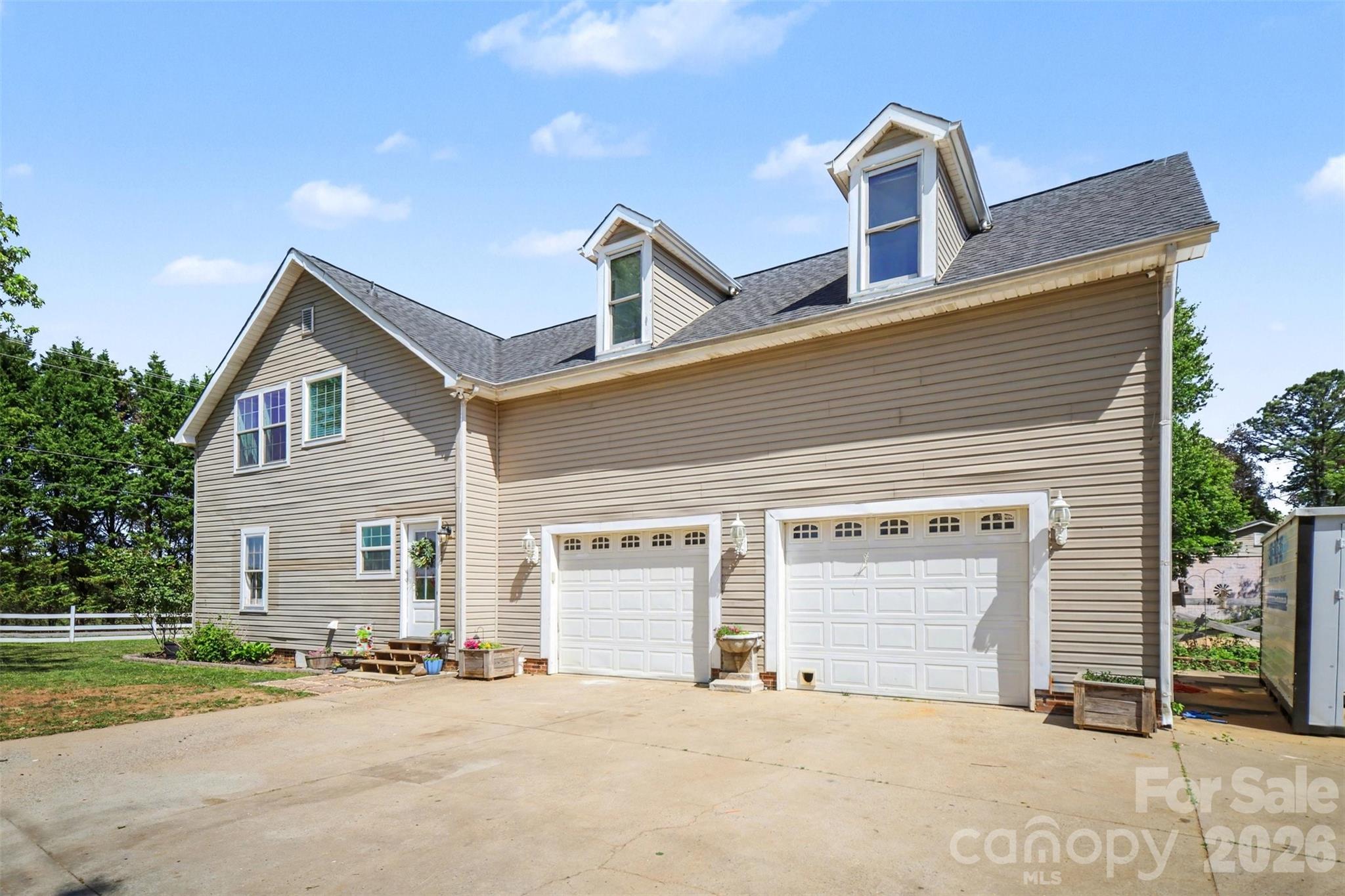 5226 Old Plank Road Iron Station, NC 28080 - Photo 40 of 45 a front view of a house with a garage