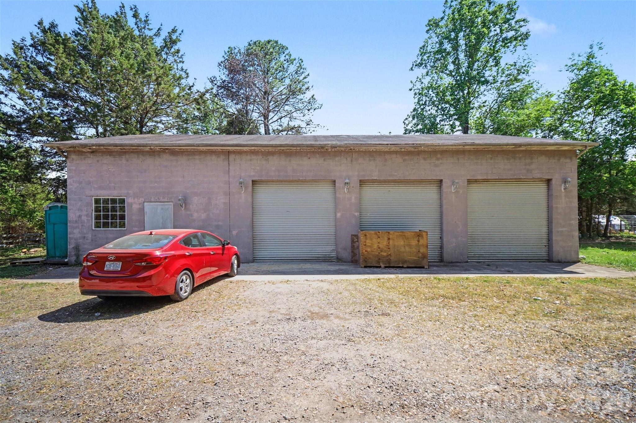 5226 Old Plank Road Iron Station, NC 28080 - Photo 41 of 45 a front view of a house with a garage