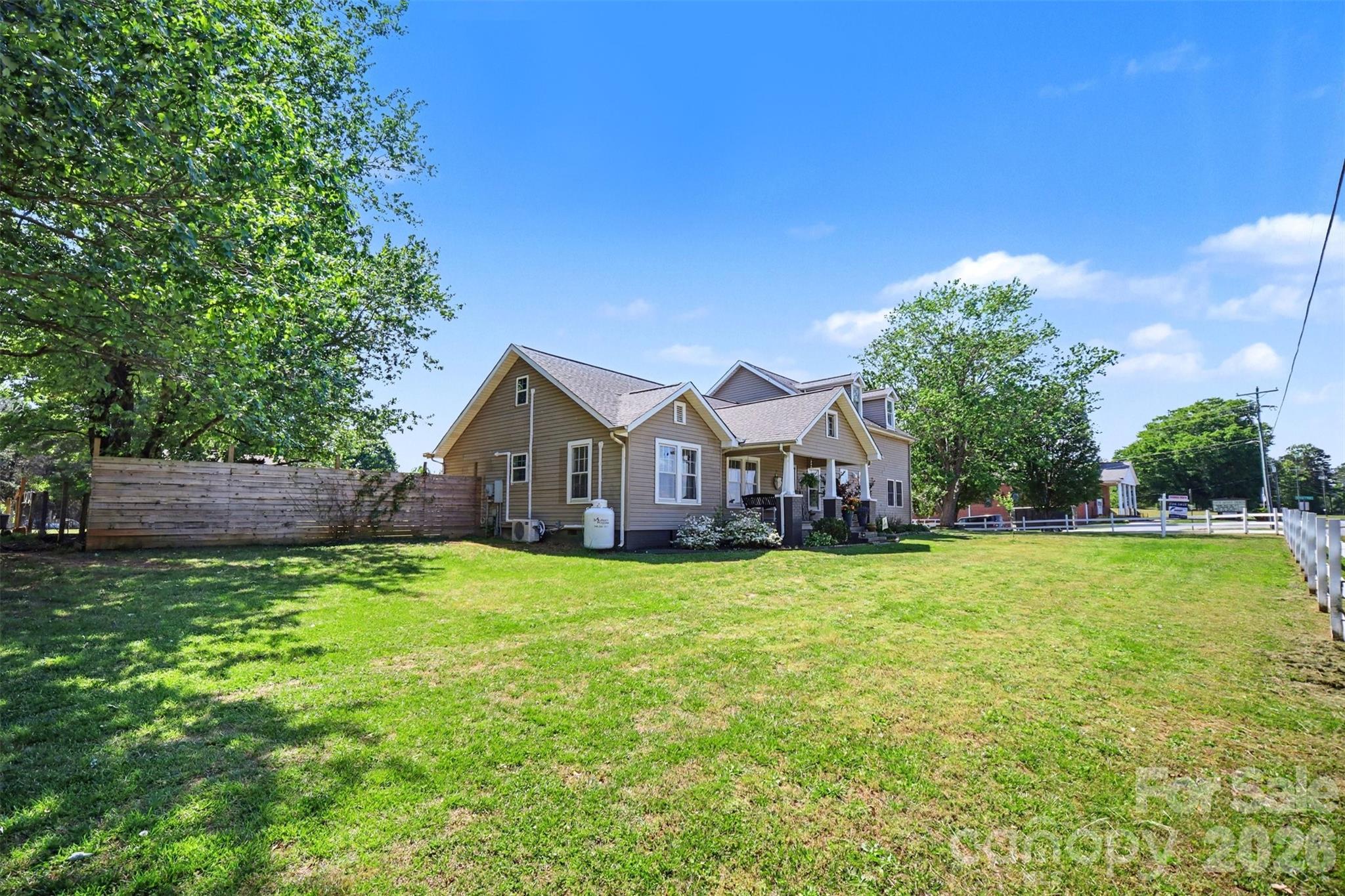 5226 Old Plank Road Iron Station, NC 28080 - Photo 42 of 45 a house view with a garden space