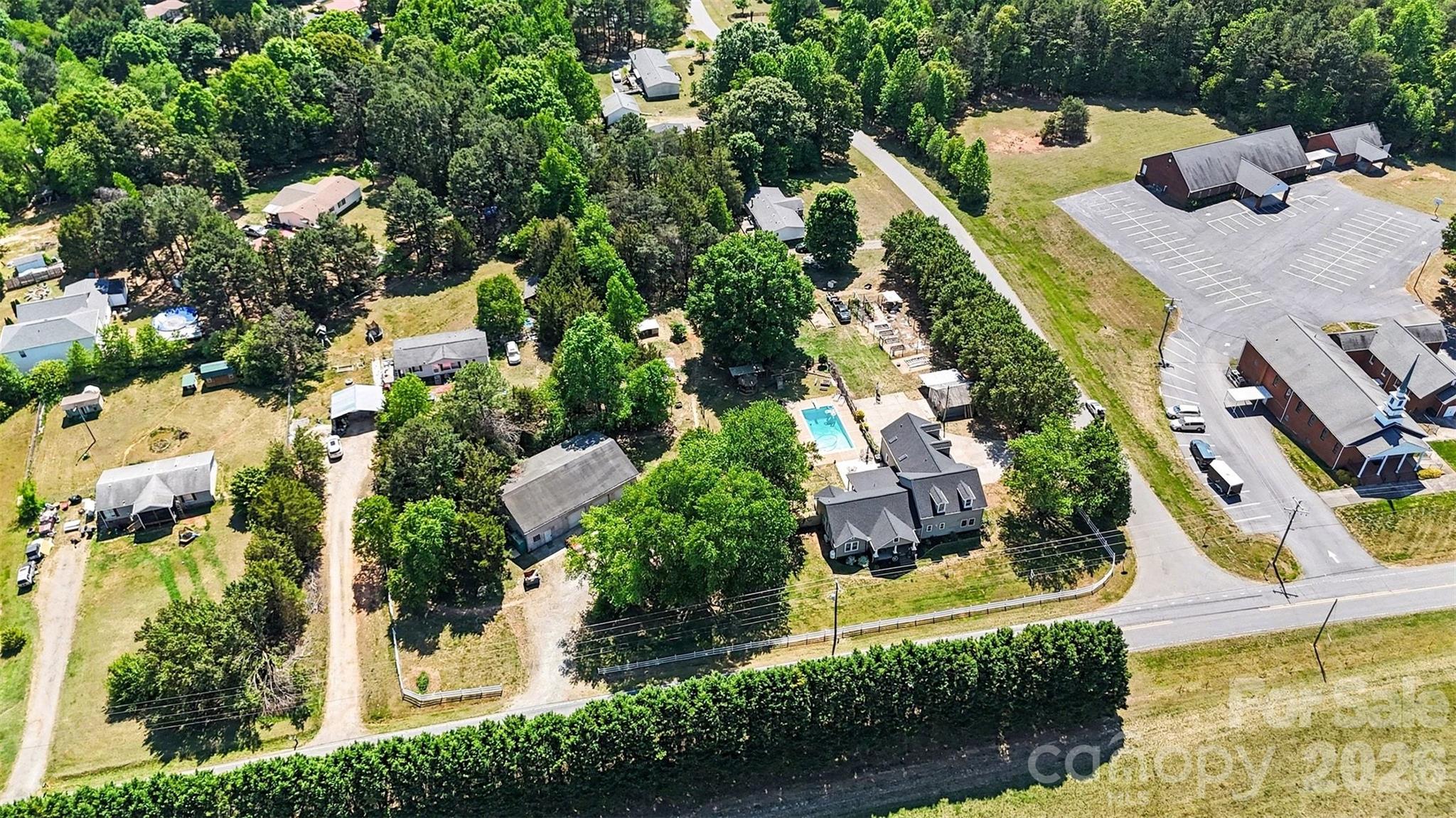 5226 Old Plank Road Iron Station, NC 28080 - Photo 44 of 45 an aerial view of house with yard swimming pool and outdoor seating