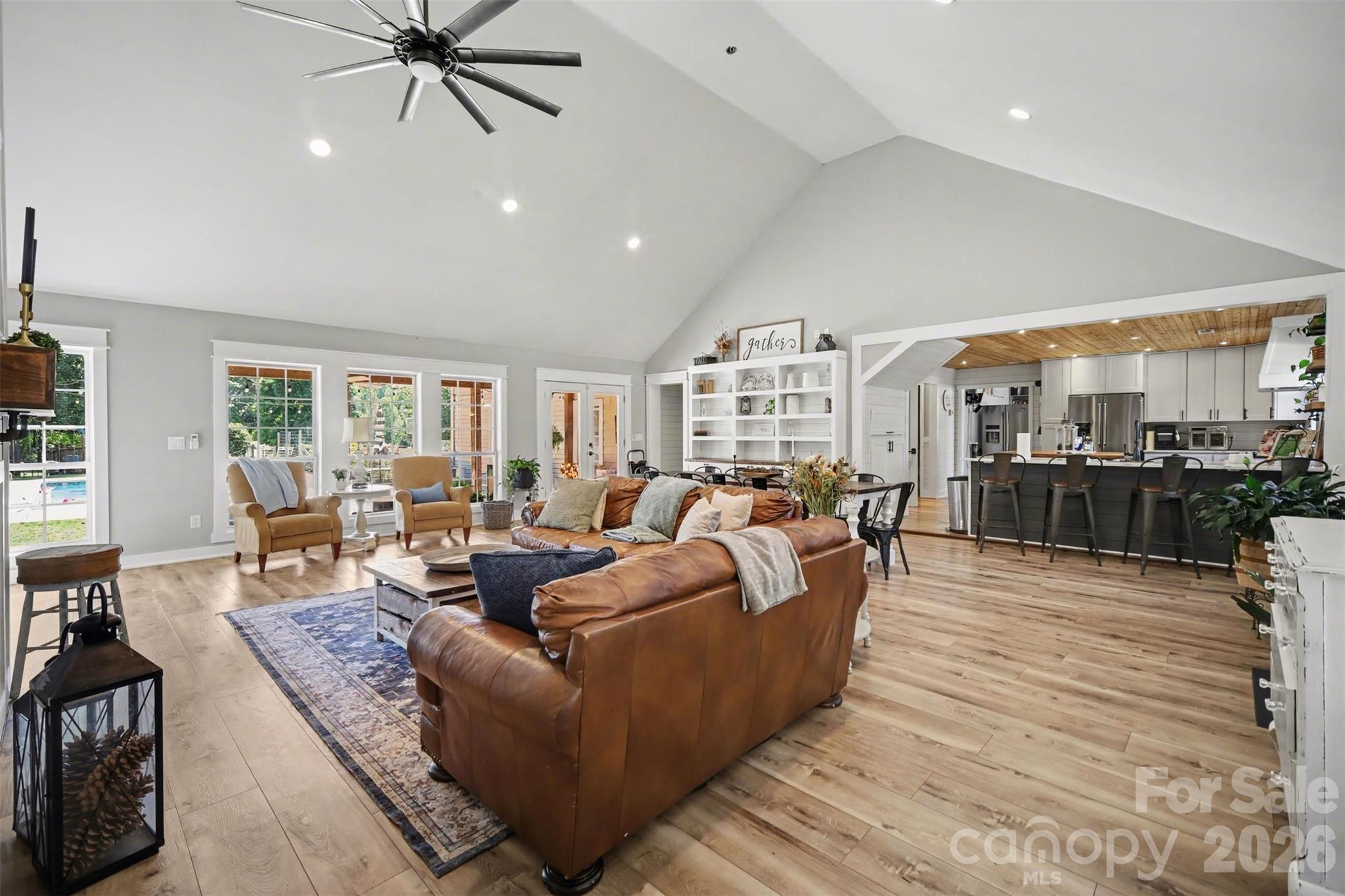 5226 Old Plank Road Iron Station, NC 28080 - Photo 5 of 45 a living room with furniture and a view of kitchen