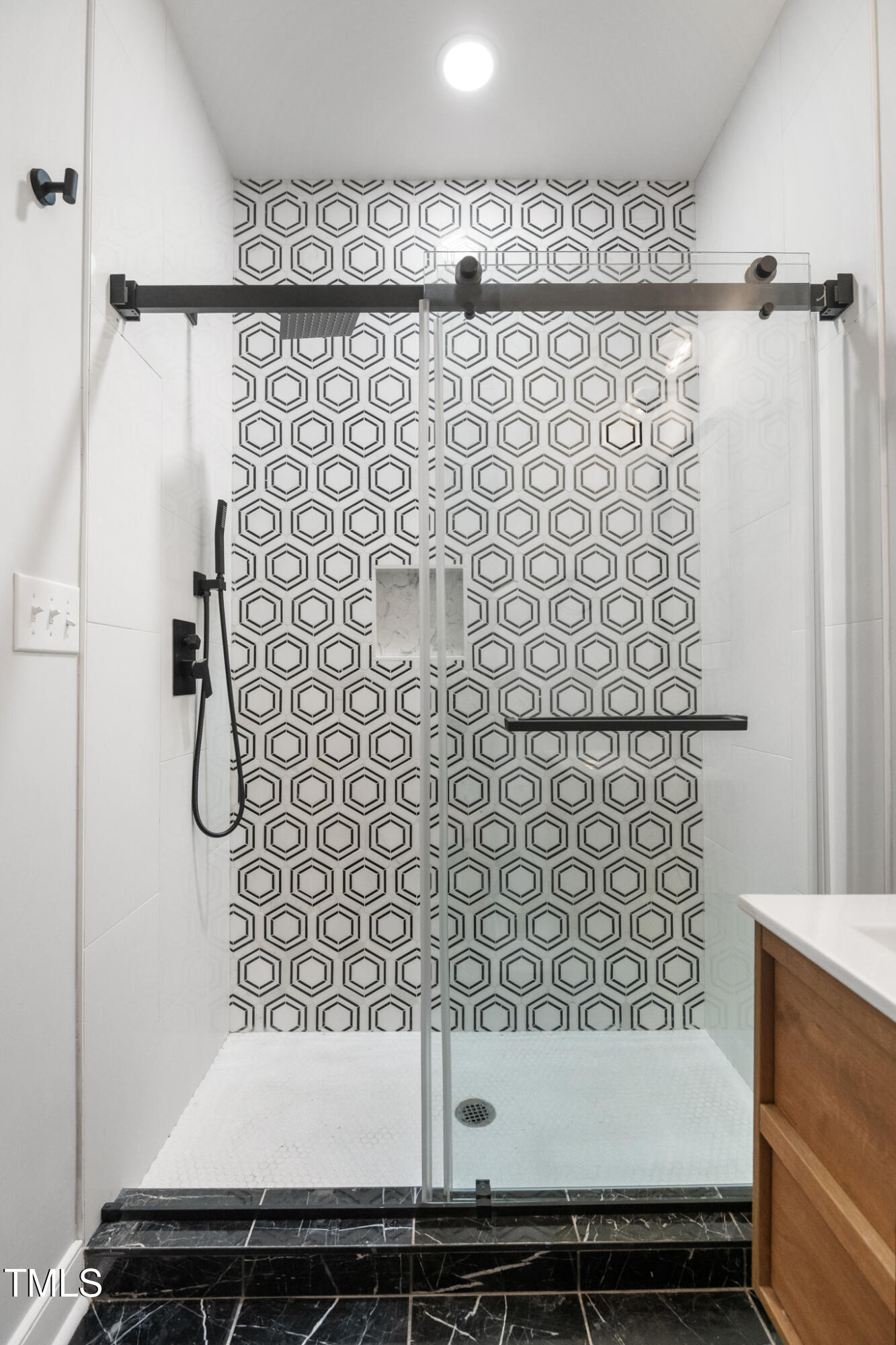 1604 Timber Wolf Drive Durham, NC 27713 - Photo 19 of 48 a bathroom with a shower