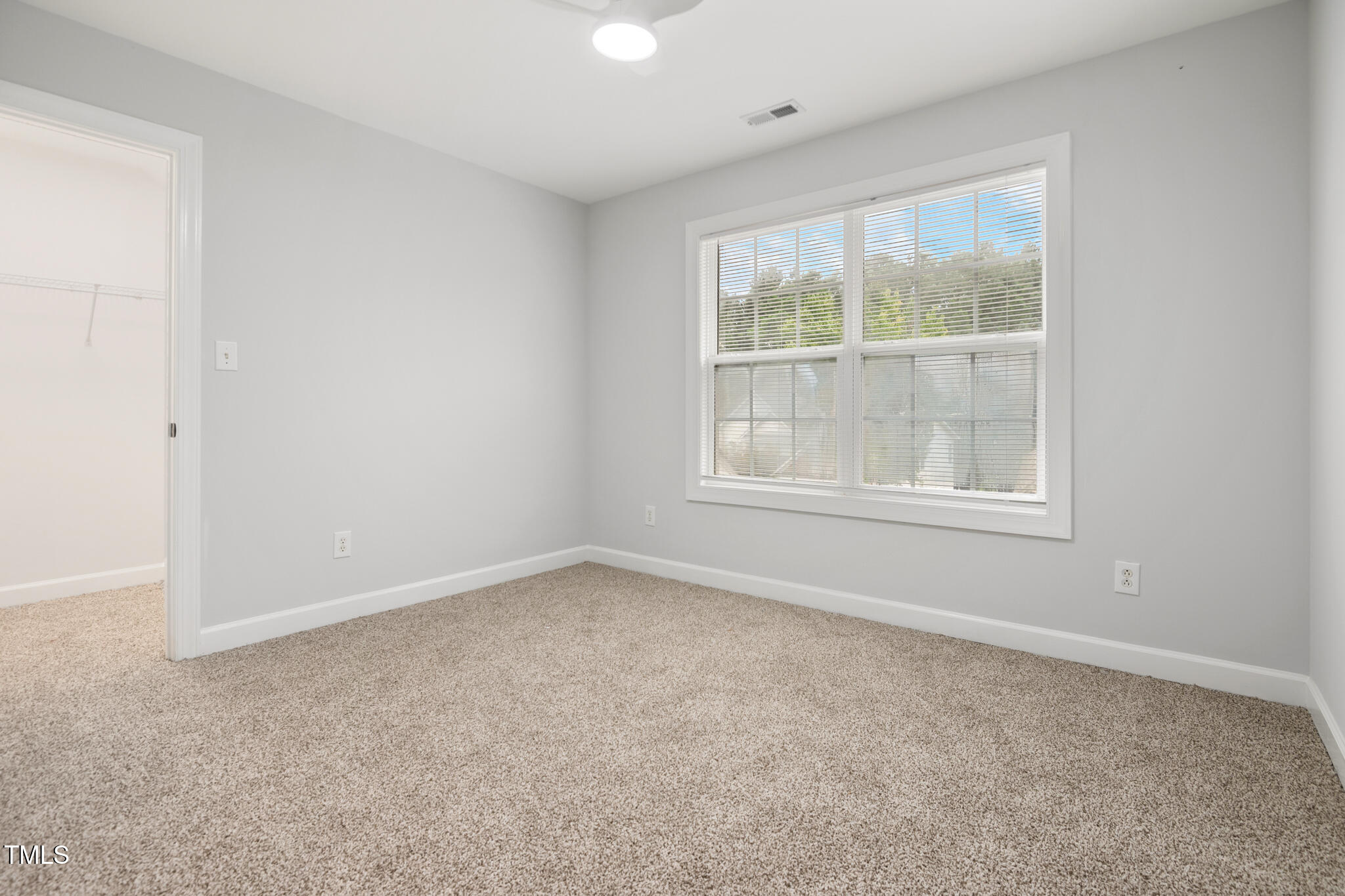 1604 Timber Wolf Drive Durham, NC 27713 - Photo 31 of 48 an empty room with a window