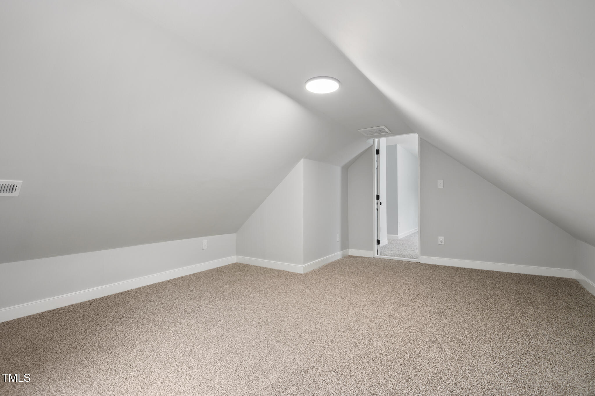 1604 Timber Wolf Drive Durham, NC 27713 - Photo 41 of 48 a view of an empty room with a window