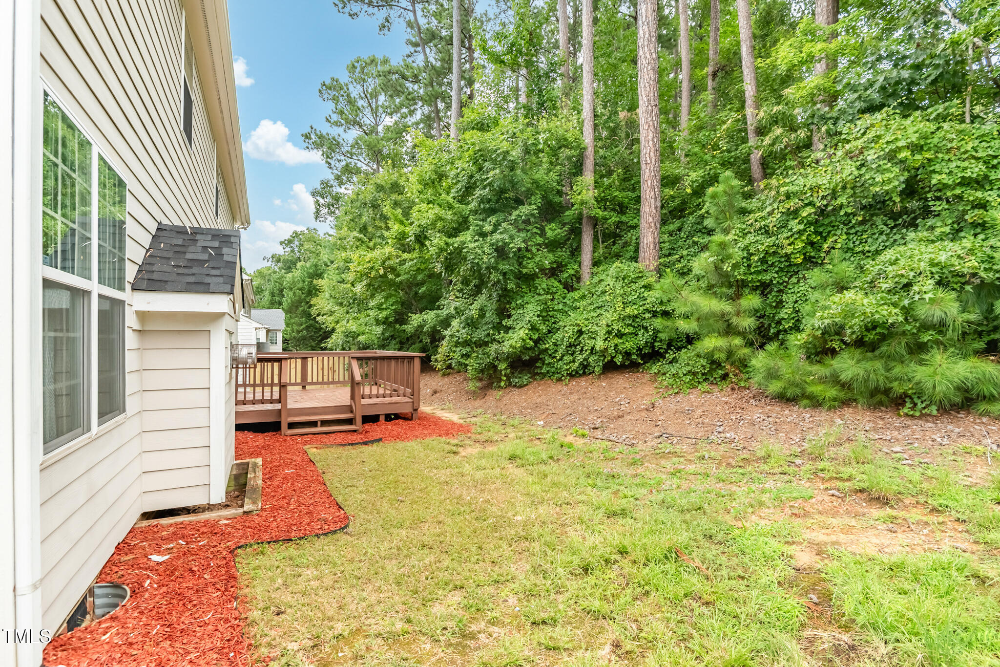 1604 Timber Wolf Drive Durham, NC 27713 - Photo 42 of 48 a balcony with trees in front of it