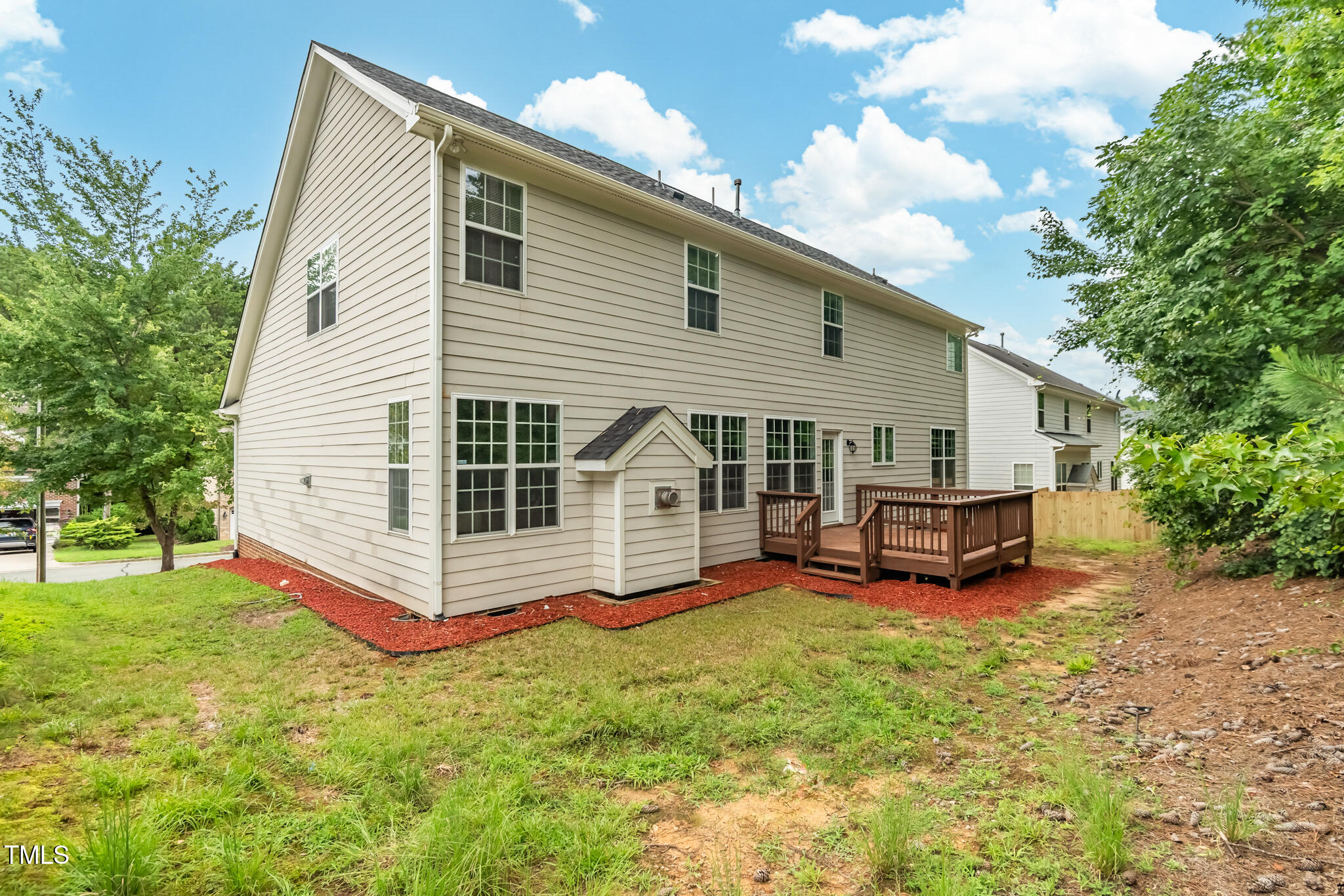 1604 Timber Wolf Drive Durham, NC 27713 - Photo 43 of 48 a view of a house with a yard and sitting area