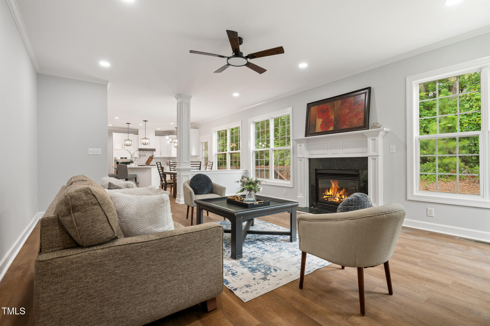 1604 Timber Wolf Drive Durham, NC 27713 - Photo 10 of 48 a living room with furniture fireplace and a table