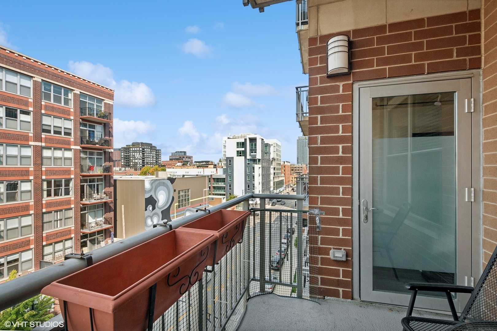 111 South Morgan Street, Unit 607 Chicago, IL 60607 - Photo 12 of 12 a balcony view with a seating space