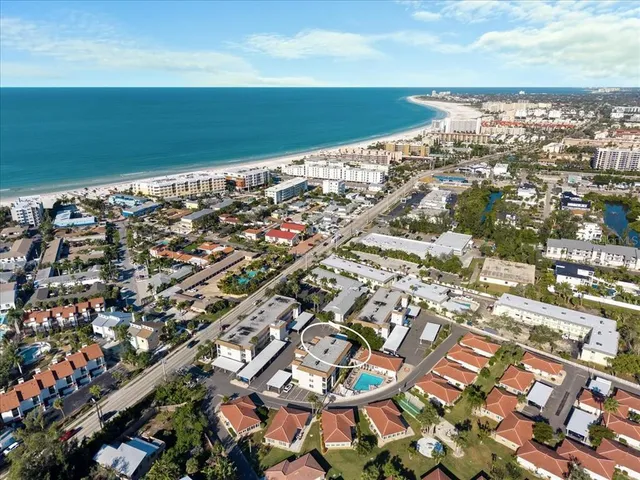a view of a house with a tree