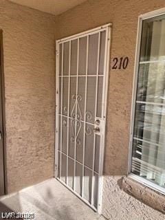 9070 Spring Mountain Road, Unit 210 Las Vegas, NV 89117 - Photo 1 of 12 Secure entry provides peace of mind in this inviting residence.
