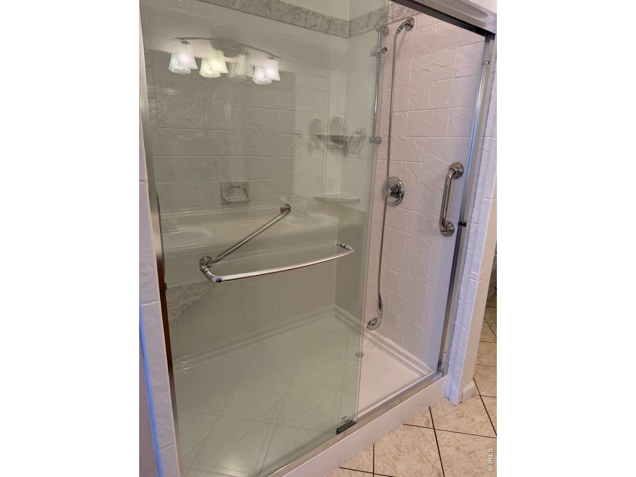 4902 29th Street, Unit 22D Greeley, CO 80634 - Photo 18 of 33 Newer walk-in shower next Primary bedroom
