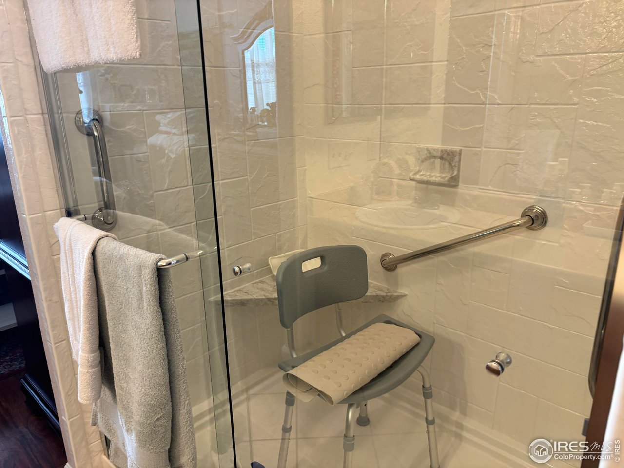 4902 29th Street, Unit 22D Greeley, CO 80634 - Photo 20 of 38 a bathroom with a sink and toilet