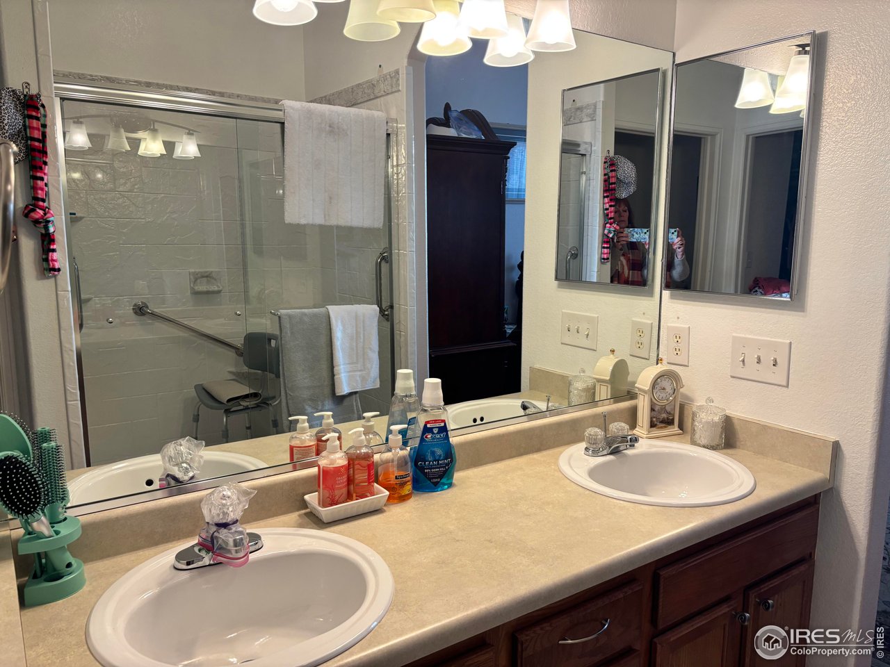 4902 29th Street, Unit 22D Greeley, CO 80634 - Photo 21 of 38 a bathroom with a sink and a mirror