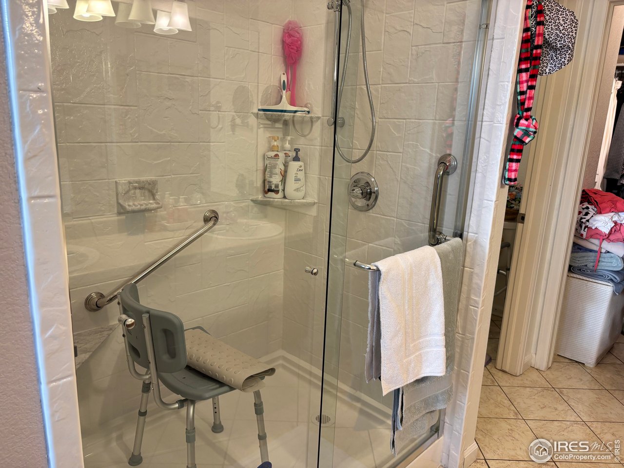 4902 29th Street, Unit 22D Greeley, CO 80634 - Photo 22 of 38 a bathroom with a shower