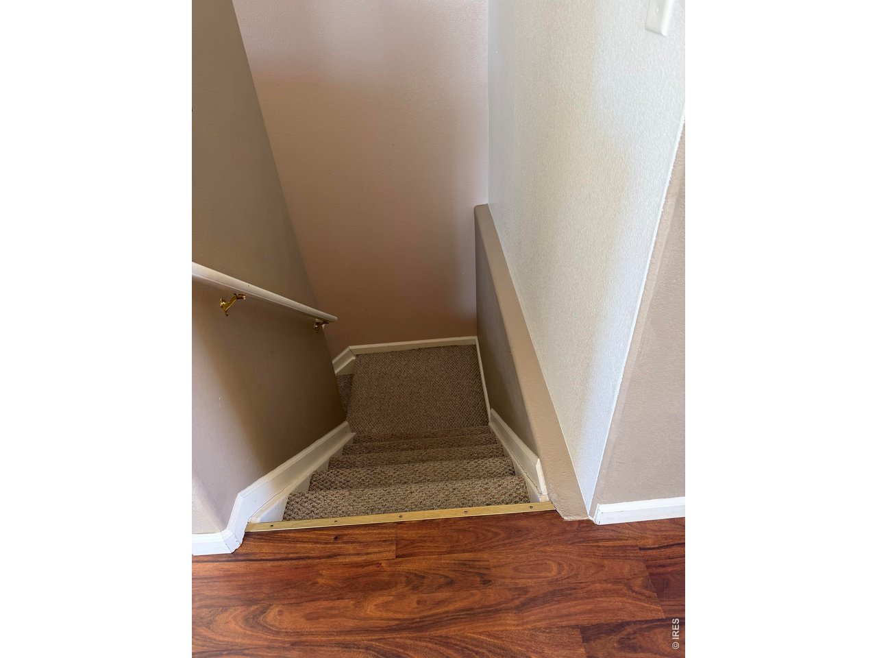 4902 29th Street, Unit 22D Greeley, CO 80634 - Photo 23 of 33 Corner bend stairs to