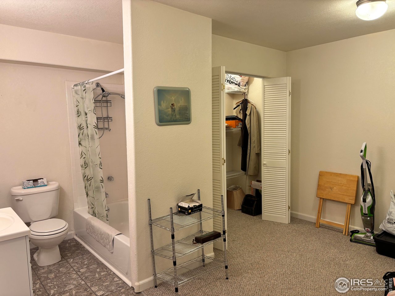 4902 29th Street, Unit 22D Greeley, CO 80634 - Photo 34 of 38 a bathroom with a toilet and a shower