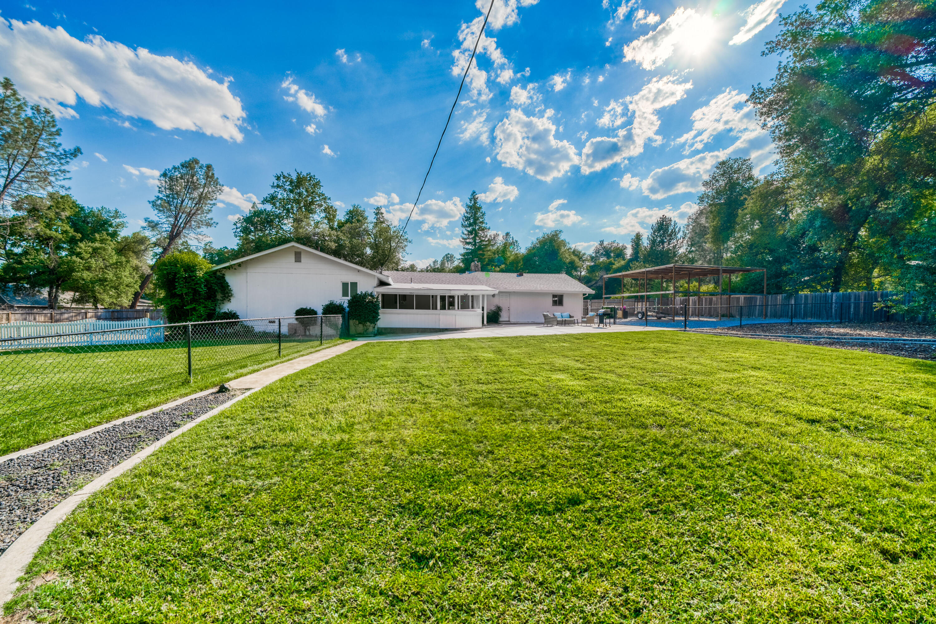 8631 Prospectors Road Redding, CA 96001 - Photo 40 of 41 a view of a house with a yard