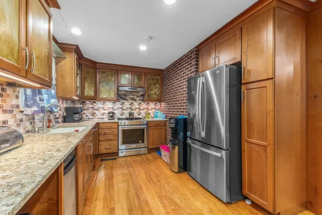 a view of residential houses with outdoor space