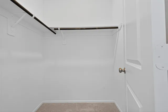 a view of small space with racks on the wall