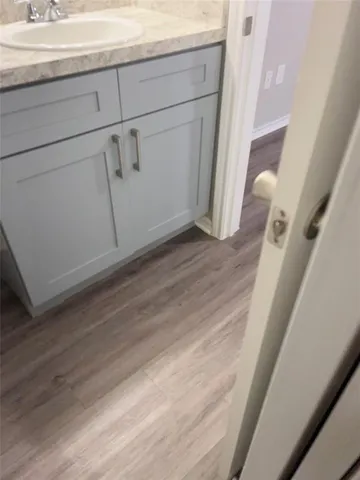 a view of a livingroom with wooden floor