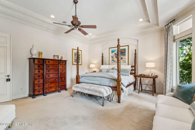 a view of a house with backyard and swimming pool