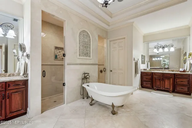 a view of empty room with wooden floor and windows